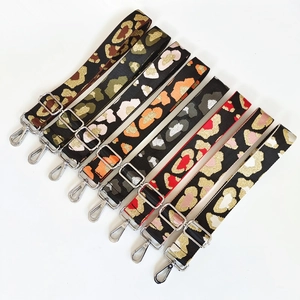 Adjustable leopard print shoulder straps with silver metal hooks for handbags