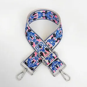 Detailed view of No.6 ethnic floral embroidery strap with silver metal hooks