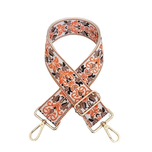 Vintage jacquard canvas shoulder strap with geometric pattern and gold metal hooks