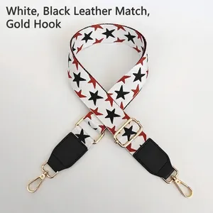 Close-up of adjustable star pattern bag strap with golden metal swivel hooks