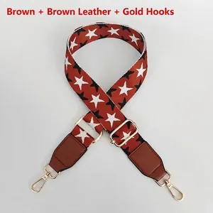 Detail of adjustable star pattern strap with brown leather and gold metal hooks