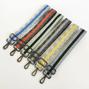 Adjustable polka dot and stripe patterned wide shoulder straps with metal swivel hooks