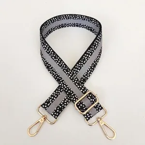 Adjustable wide replacement shoulder strap with black and white geometric pattern and gold hooks