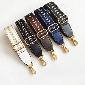 Five adjustable woven shoulder straps with V-pattern and gold metal buckles