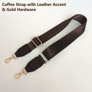 Detail of coffee nylon strap with gold hardware hooks and matching leather reinforcement
