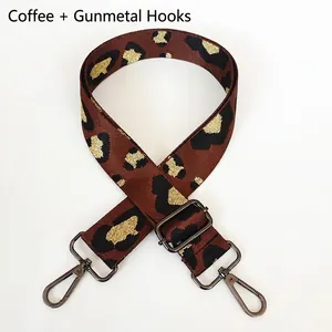 Detail of coffee leopard print bag strap with gunmetal swivel hooks and adjustable buckle