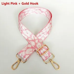 Adjustable light pink leopard print replacement bag strap with gold metal hardware