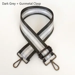 Adjustable dark grey striped strap with gunmetal hooks for backpacks and handbags