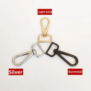 Detail of durable swivel lobster clasps in gold, silver, and gunmetal for bag straps