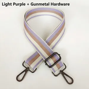 Detail of light purple and brown striped bag strap with gunmetal adjustable hook
