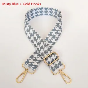 Haze blue and white houndstooth jacquard bag strap with gold metal hooks and buckle