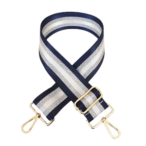 Adjustable navy and silver striped wide bag strap with durable gold metal swivel hooks