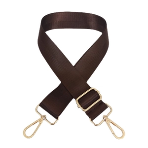 Adjustable brown nylon shoulder strap for crossbody bags with gold metal hardware