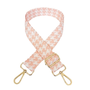 Pink houndstooth jacquard bag strap with gold metal hooks and adjustable length