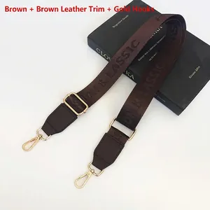 Adjustable brown nylon wide bag strap with gold metal hooks and fashion lettering