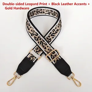 Adjustable leopard print canvas shoulder strap with black leather ends and gold hooks