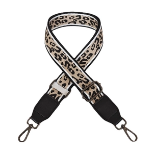 Adjustable leopard print canvas bag strap with black leather ends and metal hooks