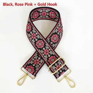 Bandoulière ethnique noire avec broderie florale rose et crochets métalliques dorés