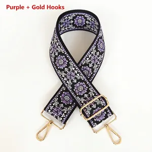 Bandoulière ethnique brodée violette et noire avec mousquetons métalliques dorés