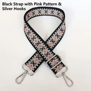 Detail of thickened canvas strap with pink diamond pattern and silver metal hooks