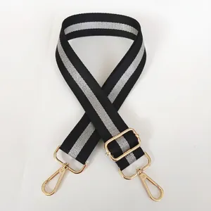 Adjustable wide striped nylon crossbody bag strap with gold metal swivel hooks