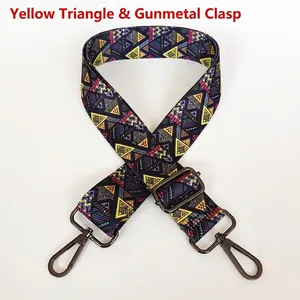 Detail of bohemian yellow triangle woven strap with gunmetal adjustable swivel hooks