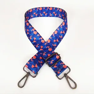 Detail of adjustable geometric strap with gunmetal hooks for crossbody bags