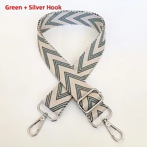 Adjustable green and beige chevron woven bag strap with polished silver metal hooks