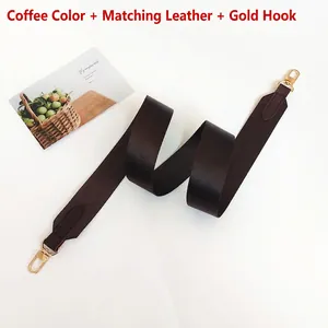 Adjustable wide canvas shoulder strap with coffee leather ends and gold metal hooks