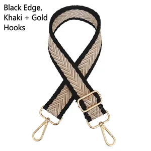 Close-up of adjustable woven purse strap with khaki chevron pattern and gold metal hooks