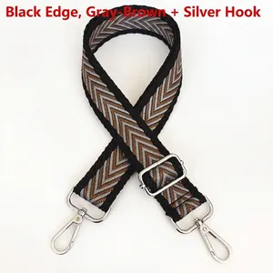 Adjustable wide canvas shoulder strap with grey and coffee herringbone pattern and silver hooks