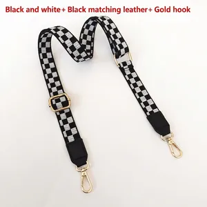 Bandoulière réglable à damier noir et blanc avec mousquetons métalliques dorés