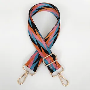 Adjustable geometric diamond pattern wide shoulder strap with golden lobster clasps for handbags