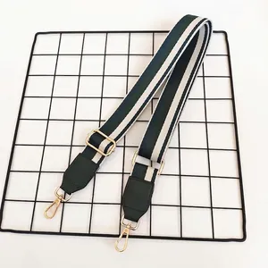 Bandoulière réglable à rayures vertes et beige avec cuir vert et boucles dorées