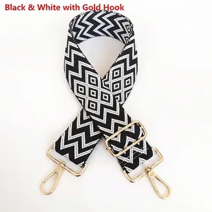 Adjustable black and white geometric woven replacement shoulder strap with gold metal hooks