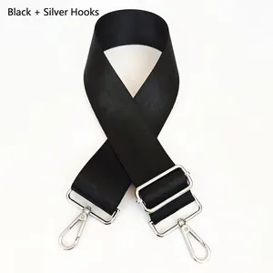 Bandoulière réglable en nylon noir avec crochets en métal argenté et texture jacquard