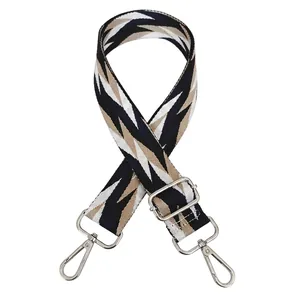 Adjustable wide shoulder strap with geometric zigzag pattern and silver metal hooks