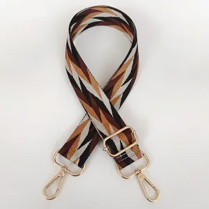 Adjustable crossbody bag strap with geometric diamond pattern and gold metal hooks
