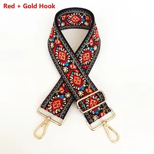 Ethnic style wide red embroidered bag strap with gold metal hooks and adjustable buckle