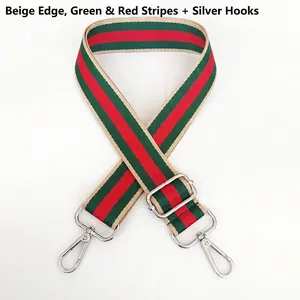 Adjustable canvas strap with green and red stripes, beige edges, and silver metal hooks