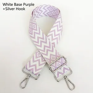 Detail of adjustable purple and white jacquard nylon strap with silver metal swivel hooks