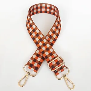 Bandoulière large réglable avec motif à carreaux marron orange et crochets dorés
