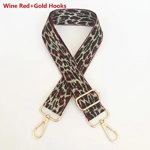 Adjustable wine red leopard print handbag strap with gold metal carabiner clips