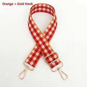 Bandoulière large réglable à motif damier orange avec attaches en métal doré