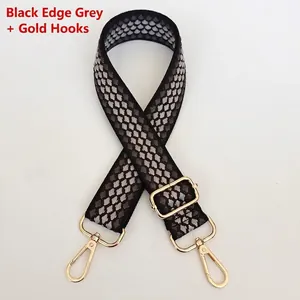 Close-up of adjustable grey checkered bag strap with premium gold metal swivel hooks