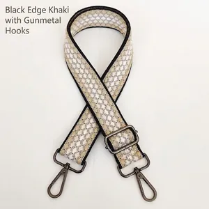 Close-up of khaki jacquard grid bag strap with durable black trim and gunmetal hardware