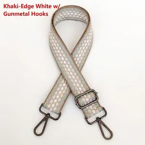 Detail view of khaki geometric jacquard strap with gunmetal lobster clasps