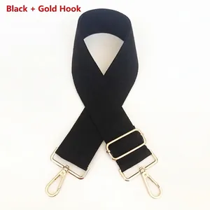 Adjustable black cotton canvas shoulder strap with polished gold metal lobster hooks