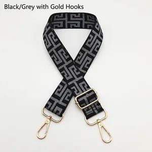 Adjustable black and grey Greek Key pattern canvas bag strap with golden metal hooks
