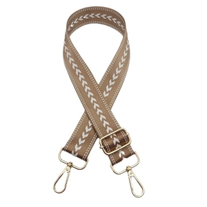 Adjustable khaki nylon bag strap with white V-pattern and gold hardware for crossbody bags